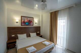 Отель Hotel Samson Сухум Стандартный номер с кроватью размера -13